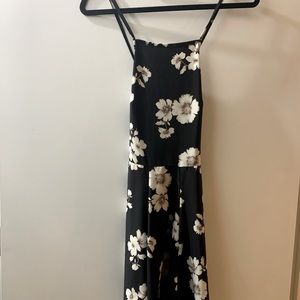 Black floral dress. Skater style